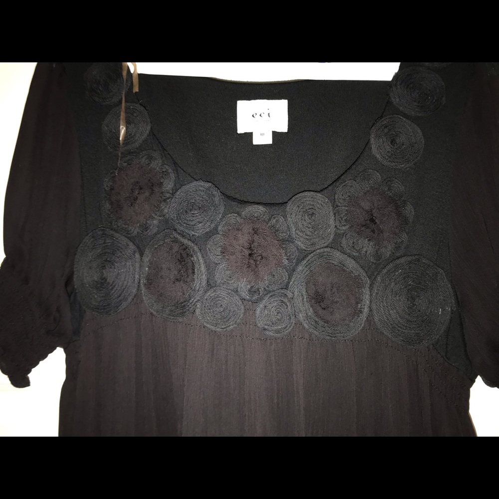 Black gauzy minidress with embroidered 3D flowers